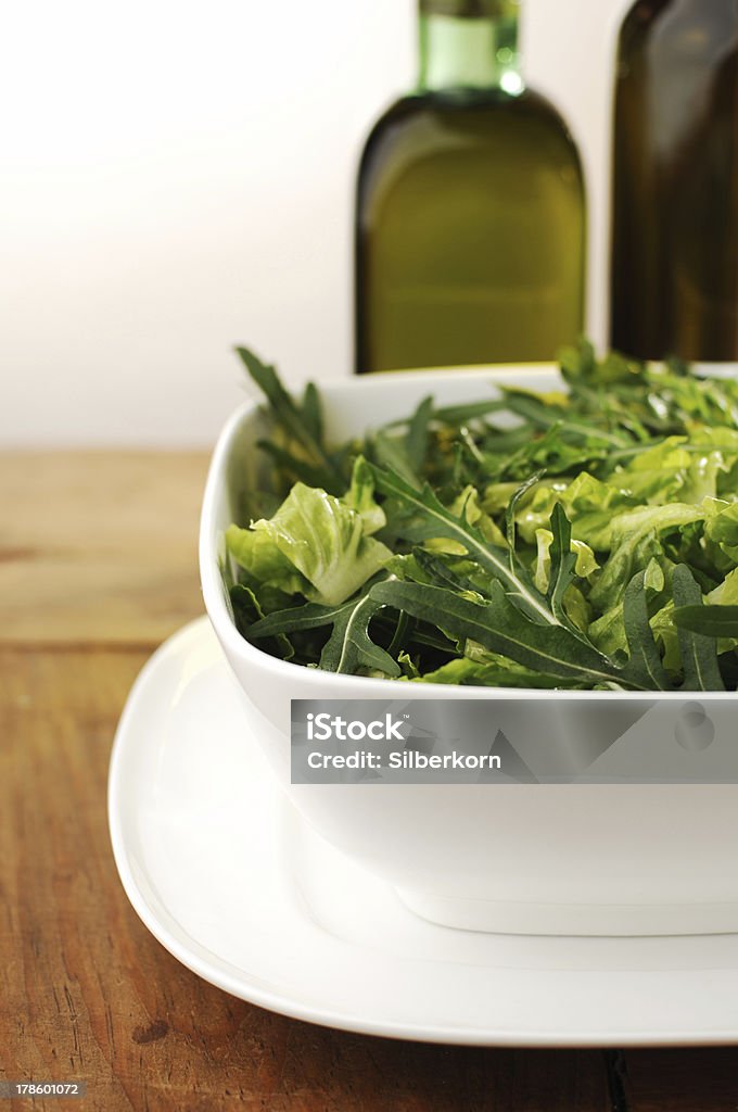 green salad "fresh green salad and dressing, shalow DOF" Acid Stock Photo