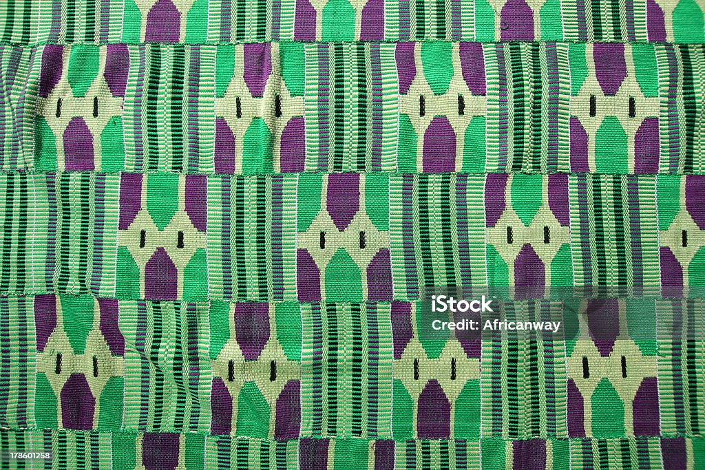 Kente Cloth, Ghana, West Africa Kente cloth are cotton fabrics made of interwoven cloth strips by the Akan tribe in Ghana and Ivory Coast. Textile Stock Photo