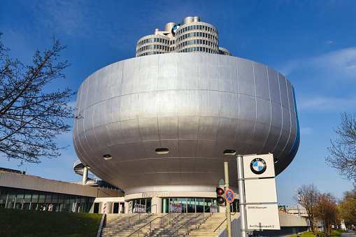 Munich, Germany - April 05, 2023: futuristic building of the BMW Museum in Munich. BMW is a German multinational manufacturer of luxury vehicles