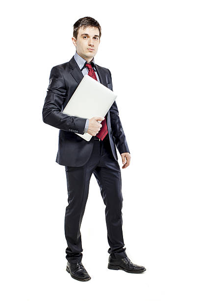 istock attractive young business man with laptop on white background 178602204