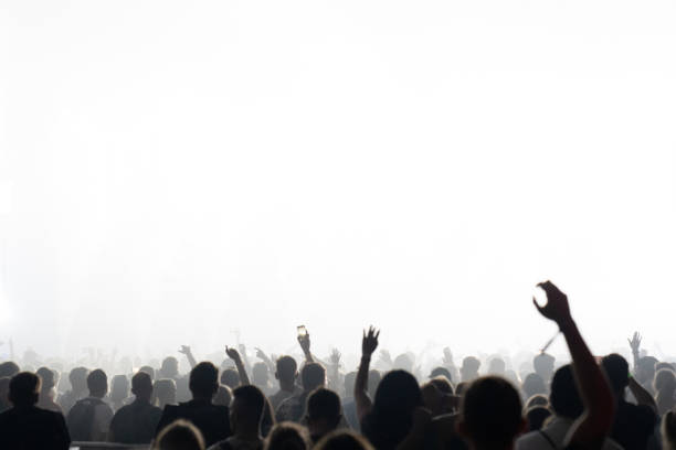 istock Crowd of people attending a concert. Cut out on white 1786023010