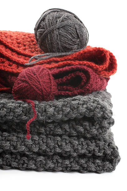 istock Knits and balls of wool on a white background 178602488