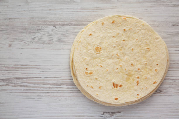 istock Homemade Mexican Corn Tortillas in a Stack, top view. Flat lay, overhead, from above. Copy space. 1786040044