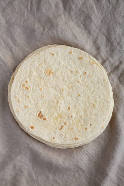 istock Homemade Mexican Corn Tortillas in a Stack, top view. Flat lay, overhead, from above. 1786040283