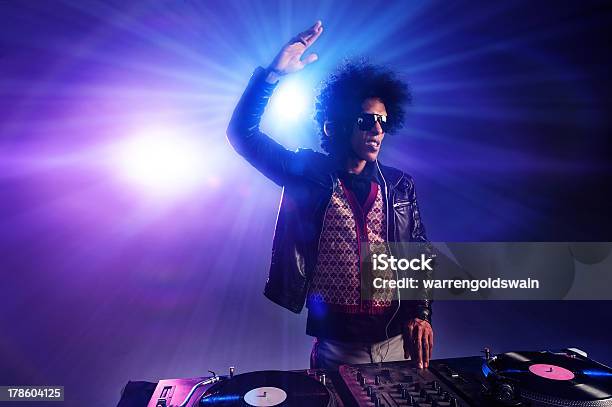 A Dj Playing Music At A Nightclub Party Stock Photo - Download Image Now - Adult, Adults Only, African Ethnicity