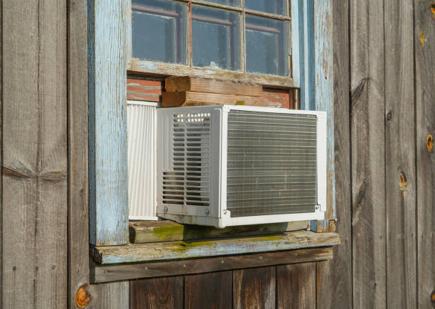 istock old air conditioner installed on old wood wall building 1786042426