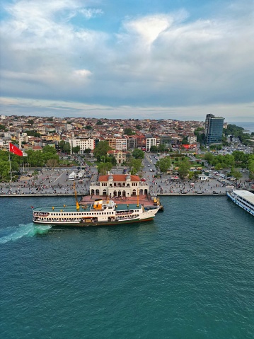 istanbul, Turkey – June 11, 2023: Aerial view of a bustling urban skyline situated above a large body of water
