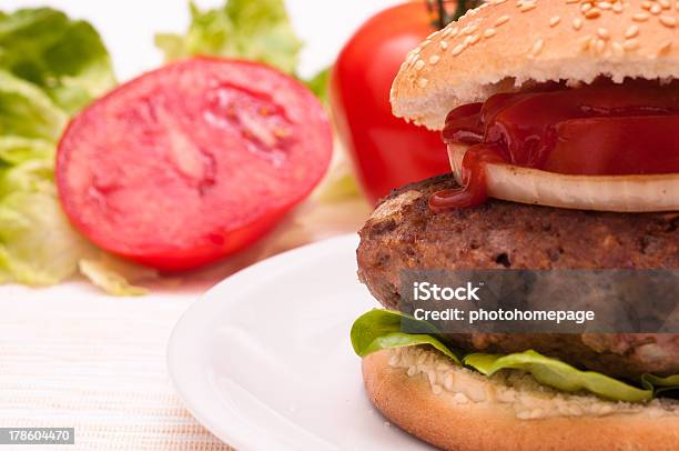 Ketchup On A Hamburger With Beef Stock Photo - Download Image Now - Beef, Bun - Bread, Close-up