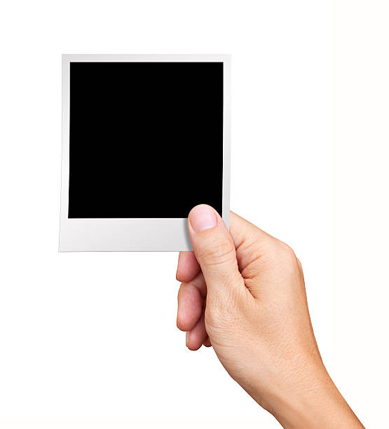 istock Hand holding blank Instant Photo on white background 178605293