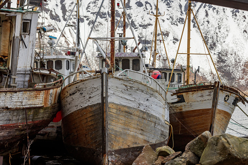 old fishing boats on the beach on the Lofoten islands; Lofoten, Norway