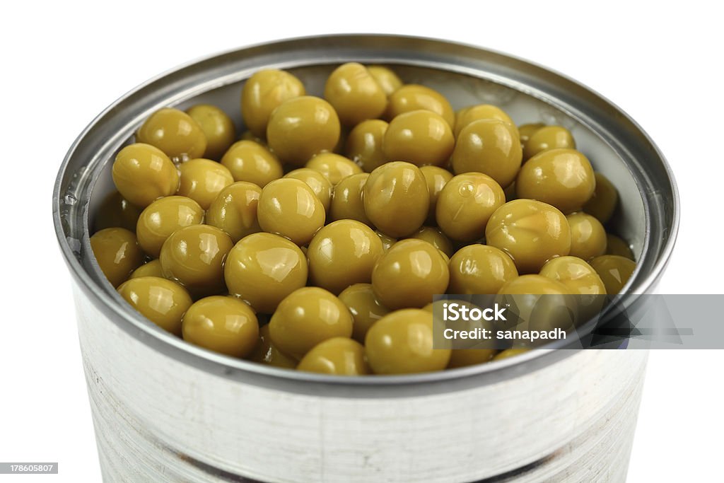 Canned Corn Canned Green Peas. Isolated with clipping path. Airtight Stock Photo