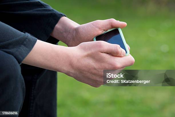 Teenager With Smartphone Stock Photo - Download Image Now - Accessibility, Beines, Black Color