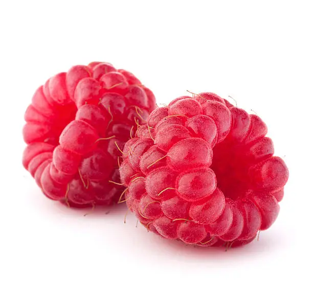 Ripe raspberries  on white background
