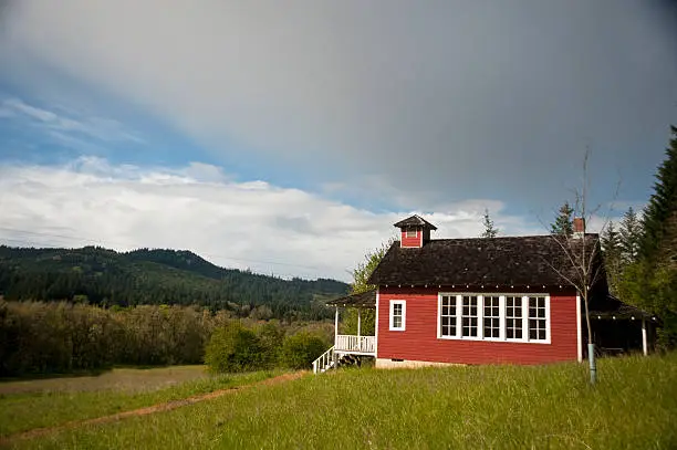 Old red one-room school house in the Willamette Valley of Oregon