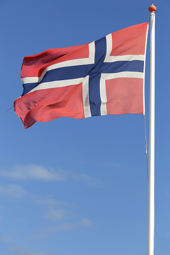 Norwegian flag flying in the wind