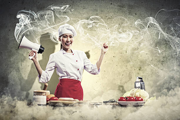 istock Asian female cook holding megaphone 178608806