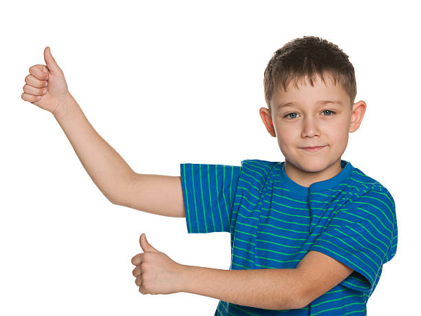 istock Young boy holds his thumbs up 178609869