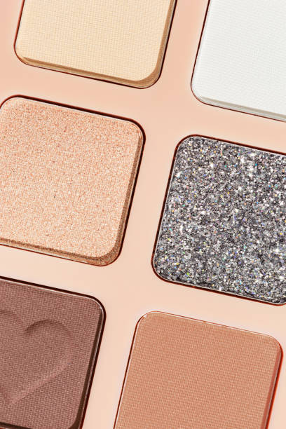 istock Top view texture pattern with different eye shadow swatches, multi colors palette in beige plastic package. Close up eyeshadows powder for makeup, cosmetics texture design, beauty background 1786100257