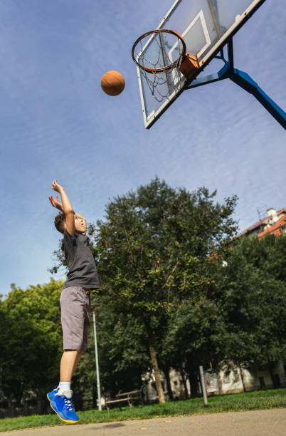 istock Cute boy plays basketball 1786108246