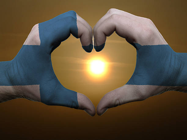 istock Heart and love gesture by hands colored in finland flag 178610955