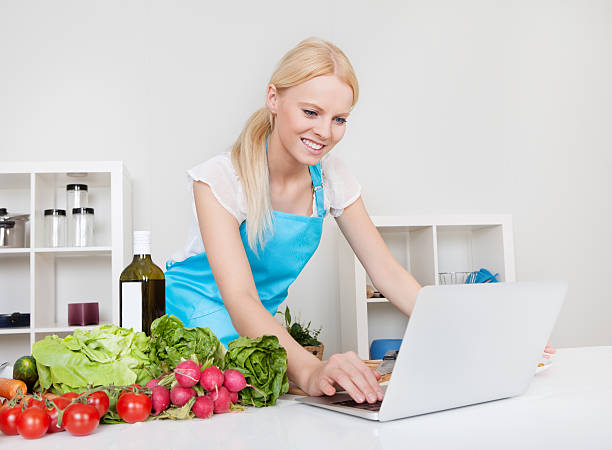 Cheerful young woman cooking