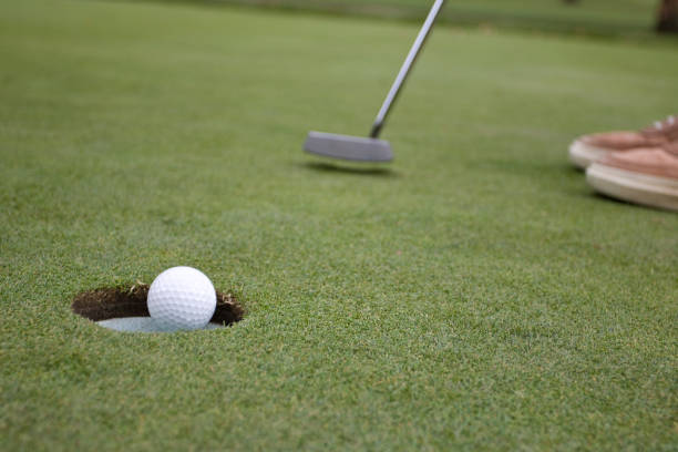 istock Putt locates the hole 1786120085