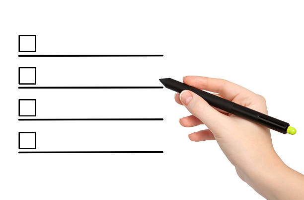 istock isolated female hand with pencil draws something 178613826