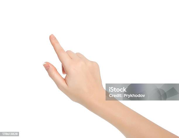 Isolated Female Hand Touching Or Pointing To Something Stock Photo - Download Image Now