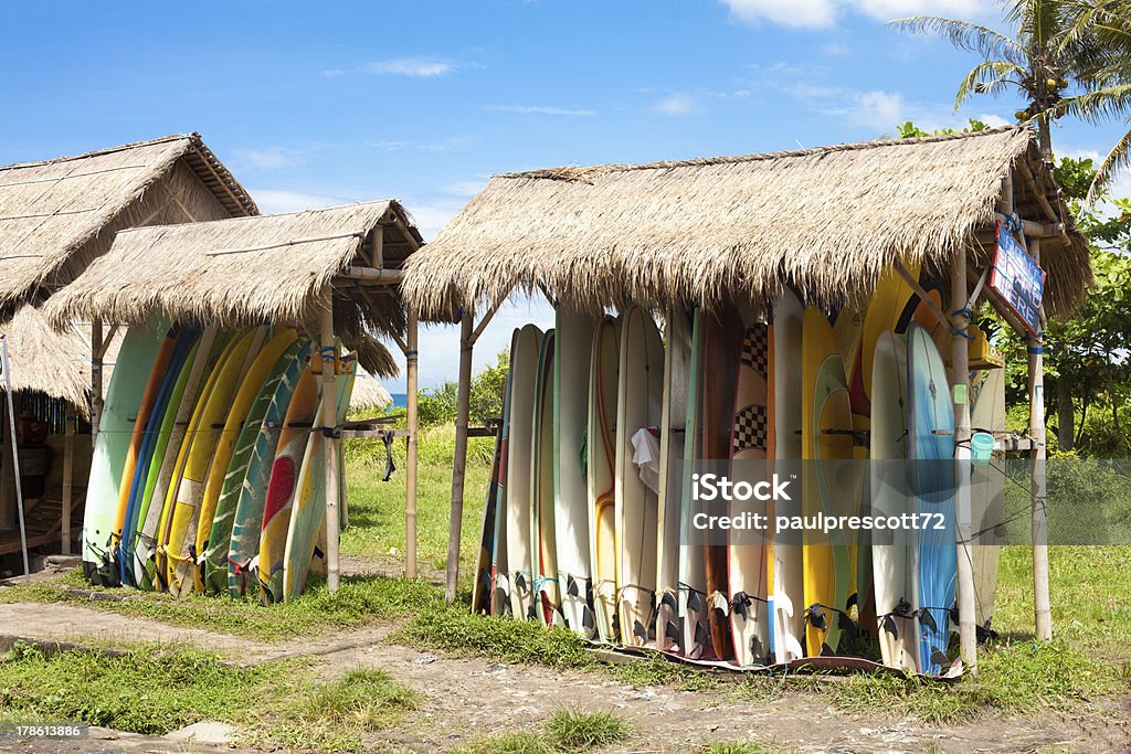 Surfboards in rack Surfboards in rack for rent on beach in Bali Surfboard Stock Photo