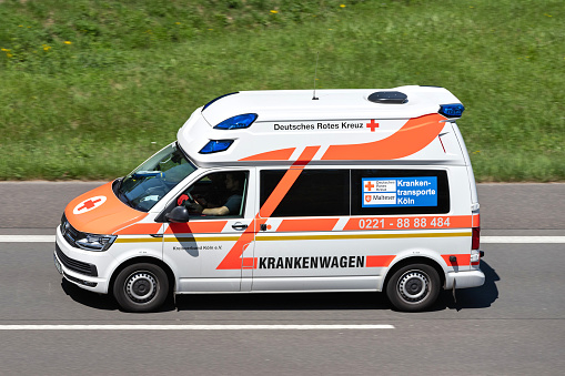 Engelskirchen, Germany - June 24, 2020: Ambulance of the German Red Cross on motorway