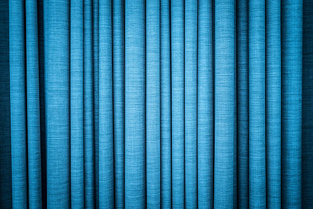 istock Blue curtain in folds. Textured background. 178614648