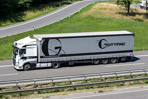 Engelskirchen, Germany - June 24, 2020: Gemtrans DAF XF truck with curtainside trailer on motorway