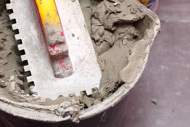 istock Construction trowel tile floor adhesive at home 178615313