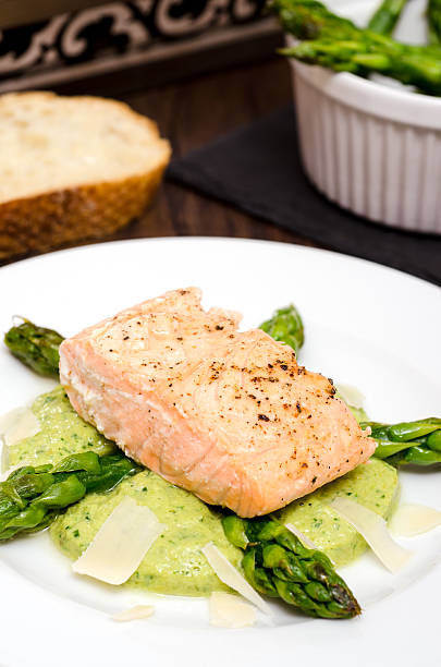 istock Roasted salmon on mash of asparagus 178615902