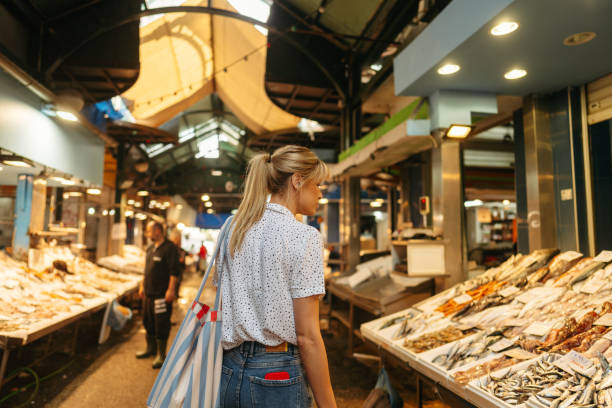 Young woman on a local fish market