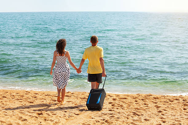 istock Young couple on the beach 178617159