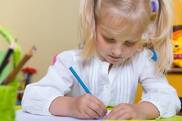 istock Cute little girl drawing 178617314
