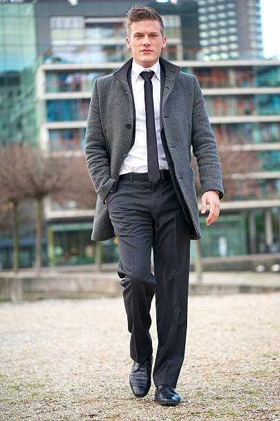 istock Young Businessman Walking Outside the Office 178618064