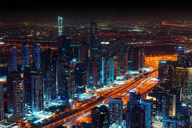 istock Dubai Marina skyscrapers and highways at night 1786181251