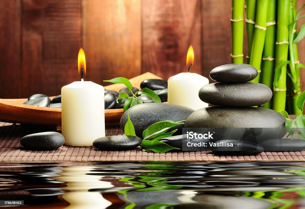 Water and stones. At creation of this photo,I was inspired with beauty of the nature. Candle Stock Photo