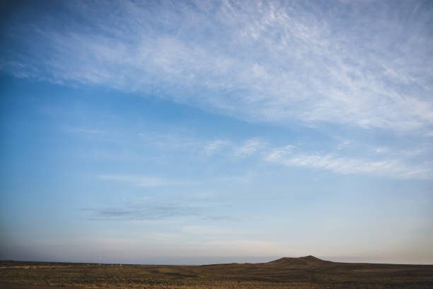 istock Minimalistic evening sky with clouds in the evening in the desert 1786187726