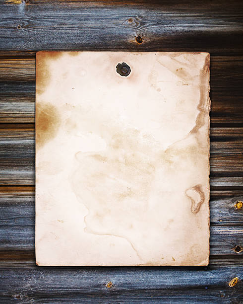 istock Old paper on the wood background 178619861