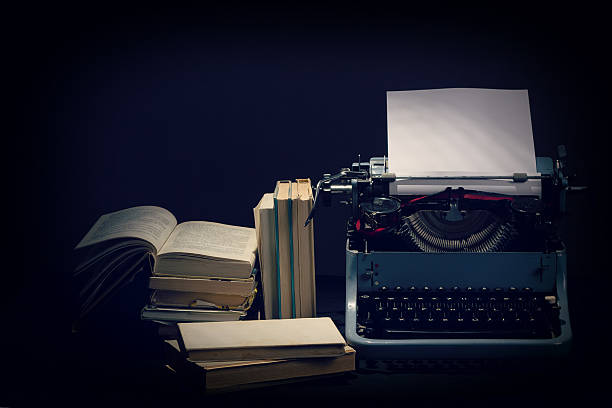 istock Old typewriter with opened books retro colors on the desk 178620321