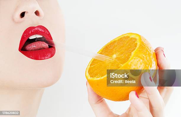 Thirsty For Orange Juice Stock Photo - Download Image Now - Adult, Adults Only, Beautiful Woman