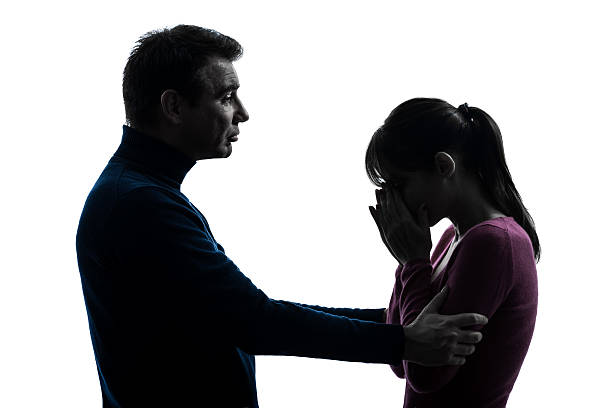 istock couple woman crying man consoling silhouette 178621732