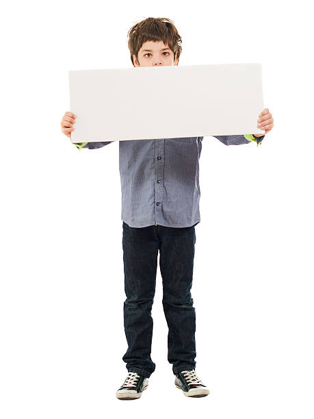istock Portrait Of Boy Holding Placard 178621984
