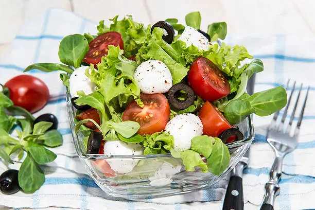 Bowl with fresh and healthy Tomato-Mozzarella Salad