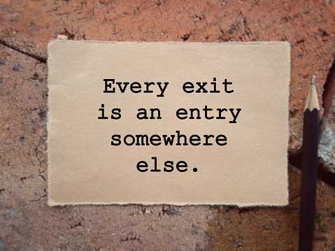 Every Exit Is An Entry Somewhere Else. With blurred style background.