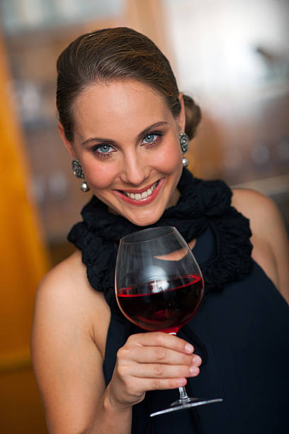 istock attractive woman with wine 178622558