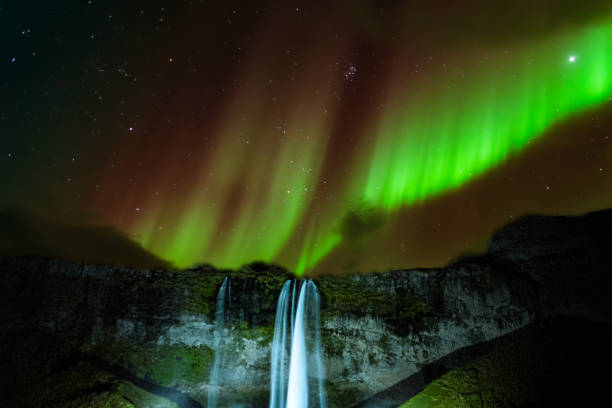 istock Northern lights above waterfall 3 1786227419